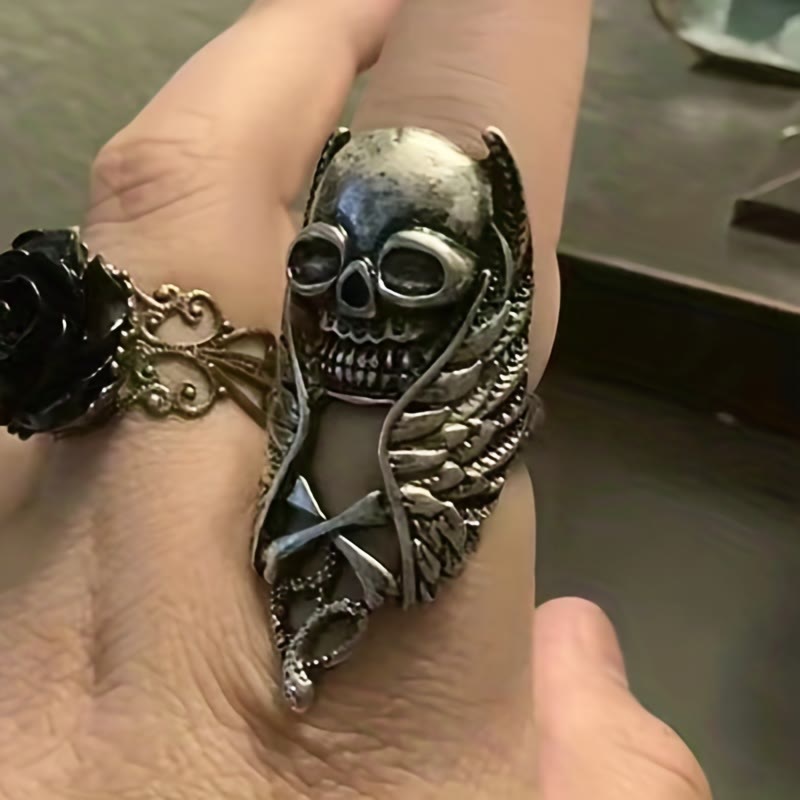 WorldNorse Punk Skull Feather Rock Ring