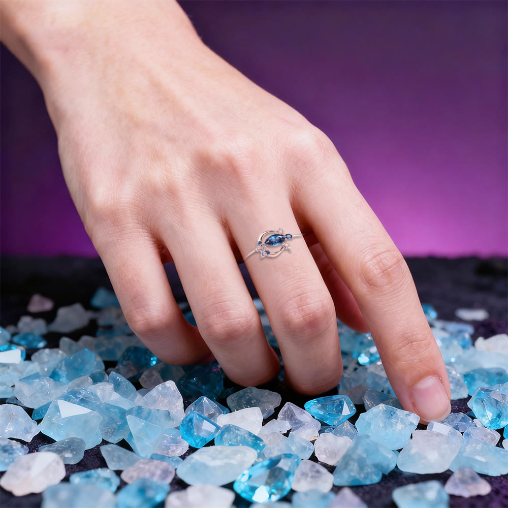 WorldNorse Blue Topaz Moon Bat Ring - image 1