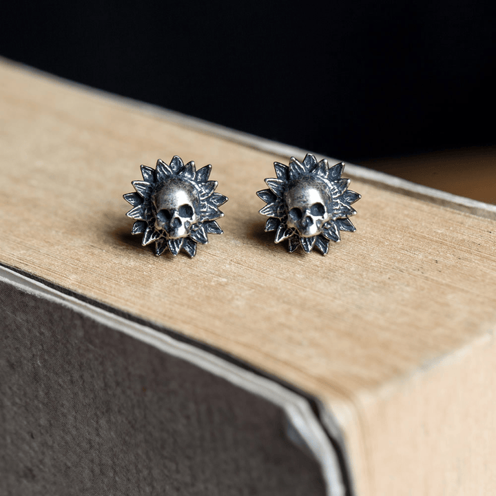 WorldNorse Sunburst Skull Carved Antiqued Earrings - Skull - image 0
